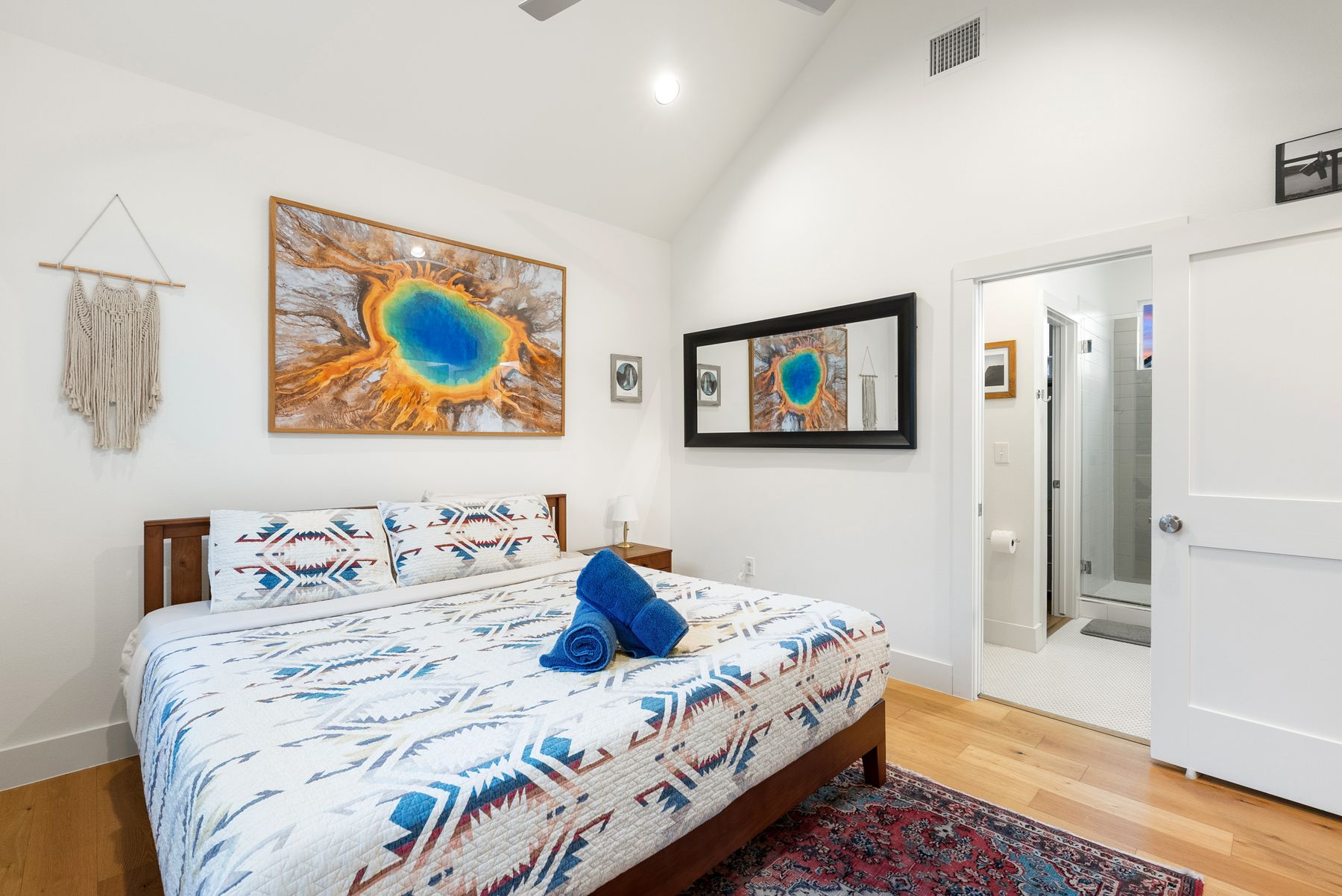 1709 Perez Street, Unit 2 Austin, TX 78721 - Photo 23 of 33 Enjoy comfort with high ceilings, recessed lighting, and rich hardwood flooring in this relaxing bedroom.