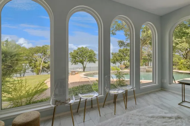 a view of hall way with furniture