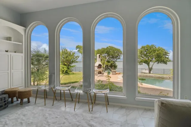 a living room with large windows