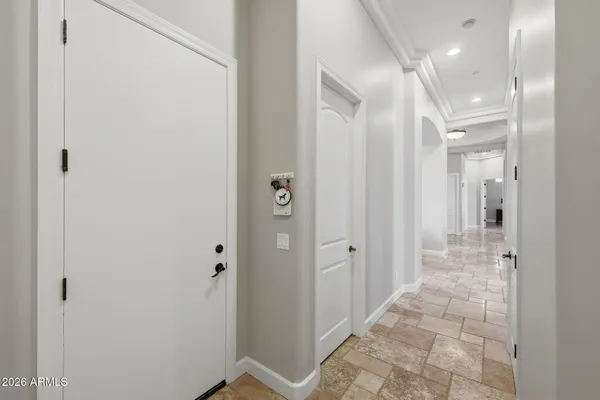 a bathroom with a granite countertop sink toilet and a mirror