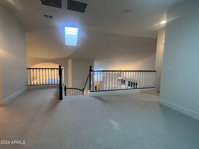 a view of empty room with windows