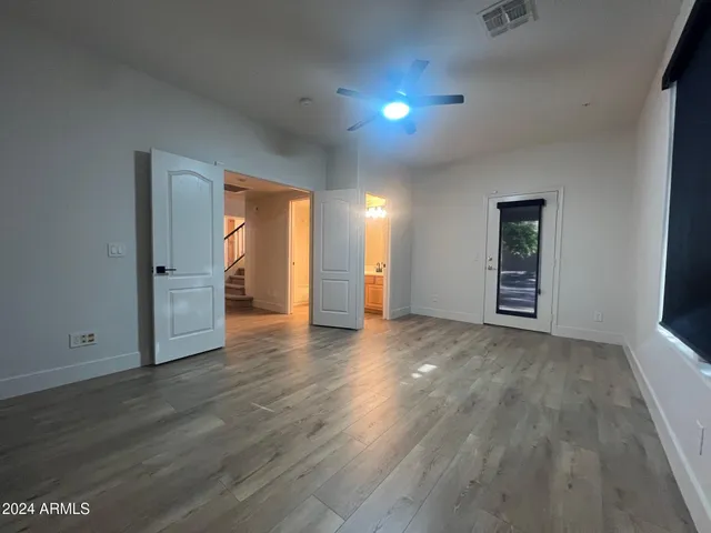 a bathroom with a sink toilet vanity and bathtub