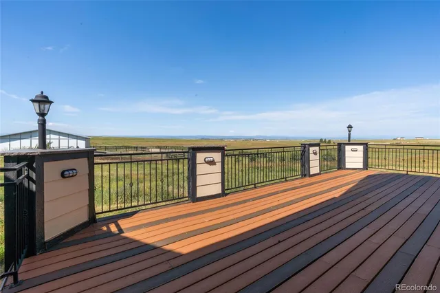 a balcony with view of ocean