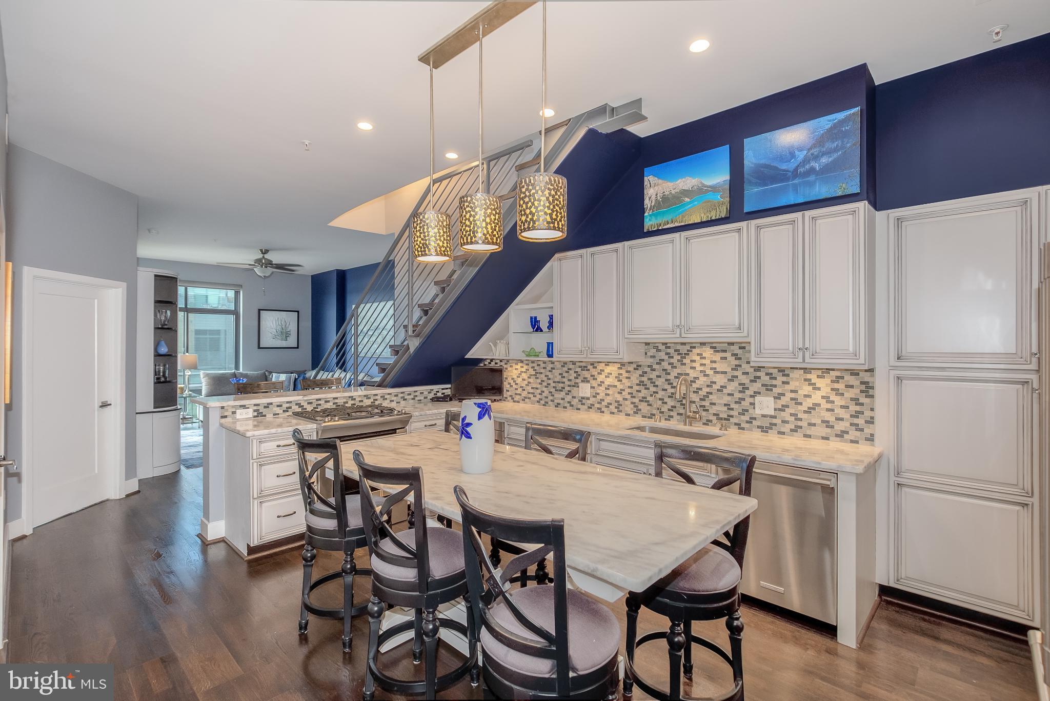 525 Water Street Southwest, Unit 403 Washington, DC 20024 - Photo 13 of 35 a view of a dining room with furniture and wooden floor