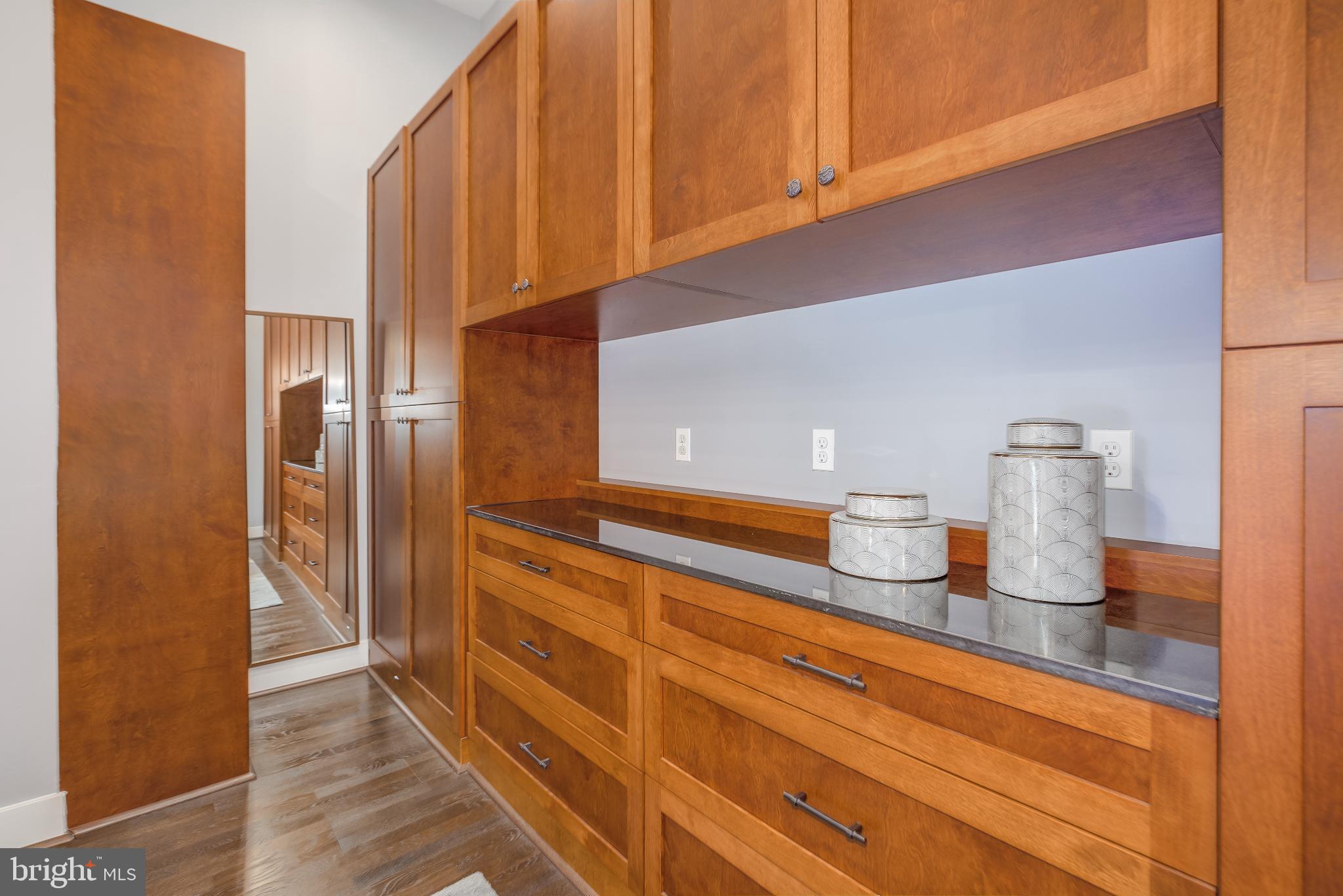 525 Water Street Southwest, Unit 403 Washington, DC 20024 - Photo 28 of 35 a kitchen with refrigerator and cabinets