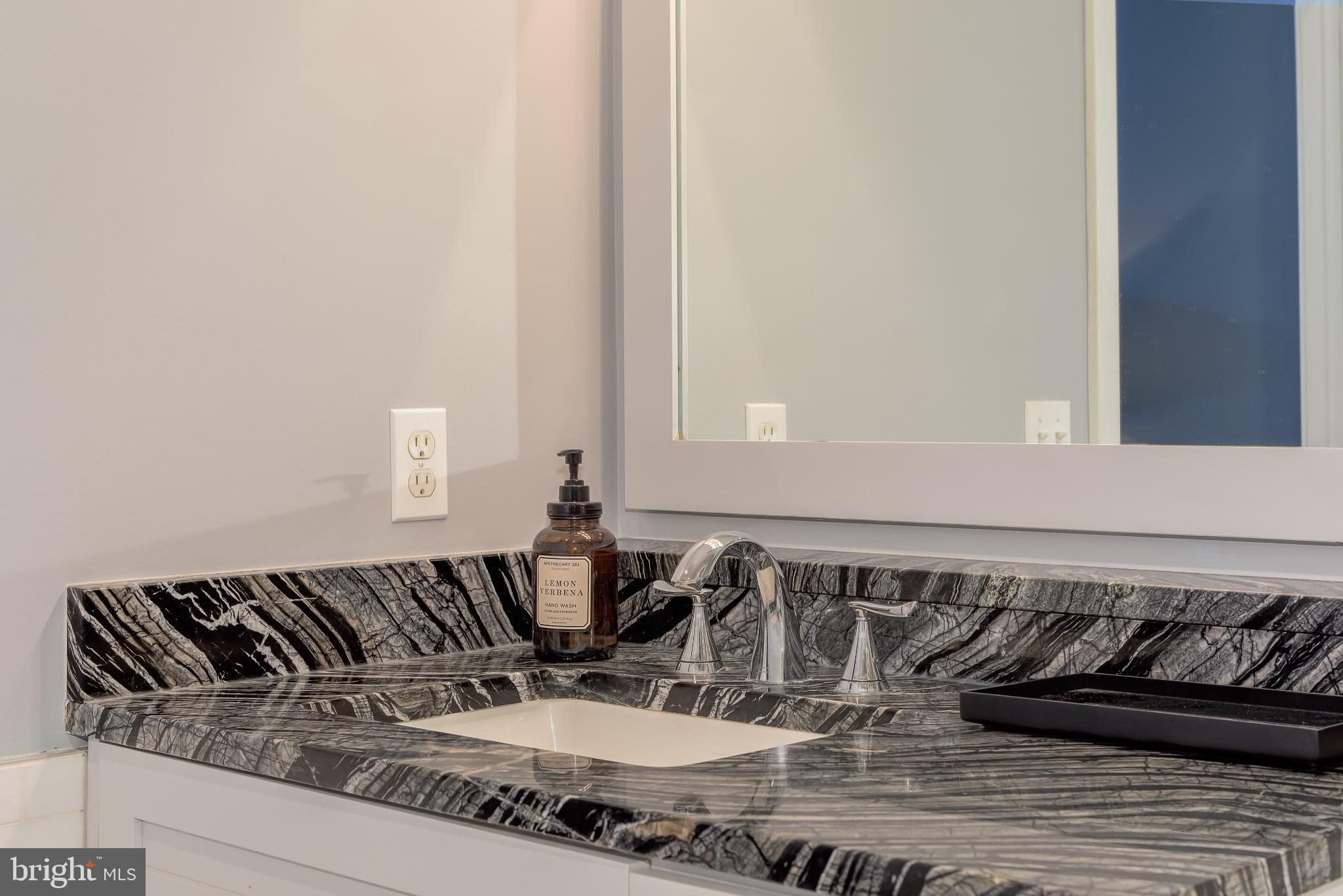 525 Water Street Southwest, Unit 403 Washington, DC 20024 - Photo 29 of 35 a close view of a sink and a table in a bathroom