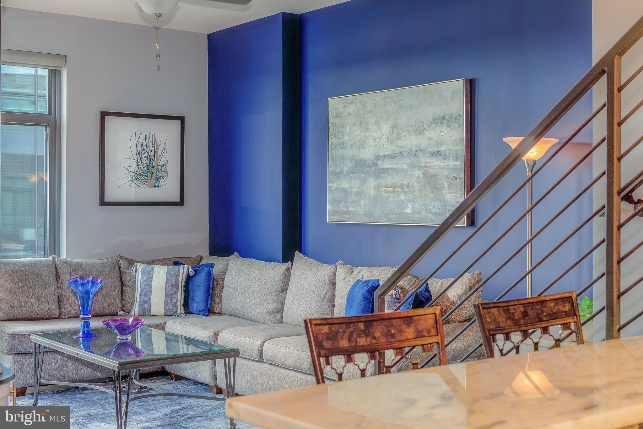 525 Water Street Southwest, Unit 403 Washington, DC 20024 - Photo 4 of 35 a living room with furniture and wooden floor