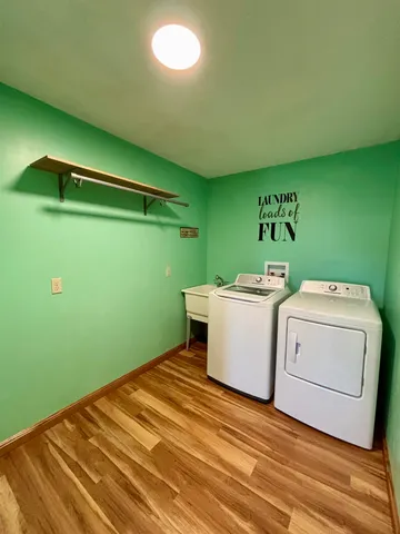 a utility room with dryer and washer