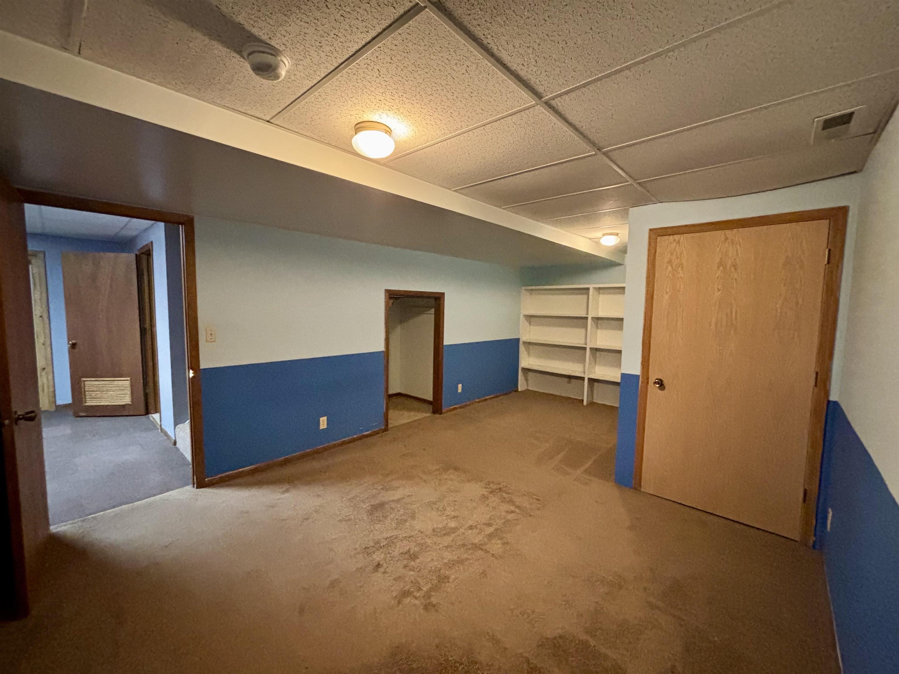 3310 South Apple River Road Elizabeth, IL 61028 - Photo 29 of 39 a view of an empty room with closet and a window