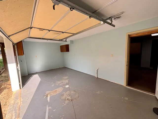 a view of a wooden deck with a yard