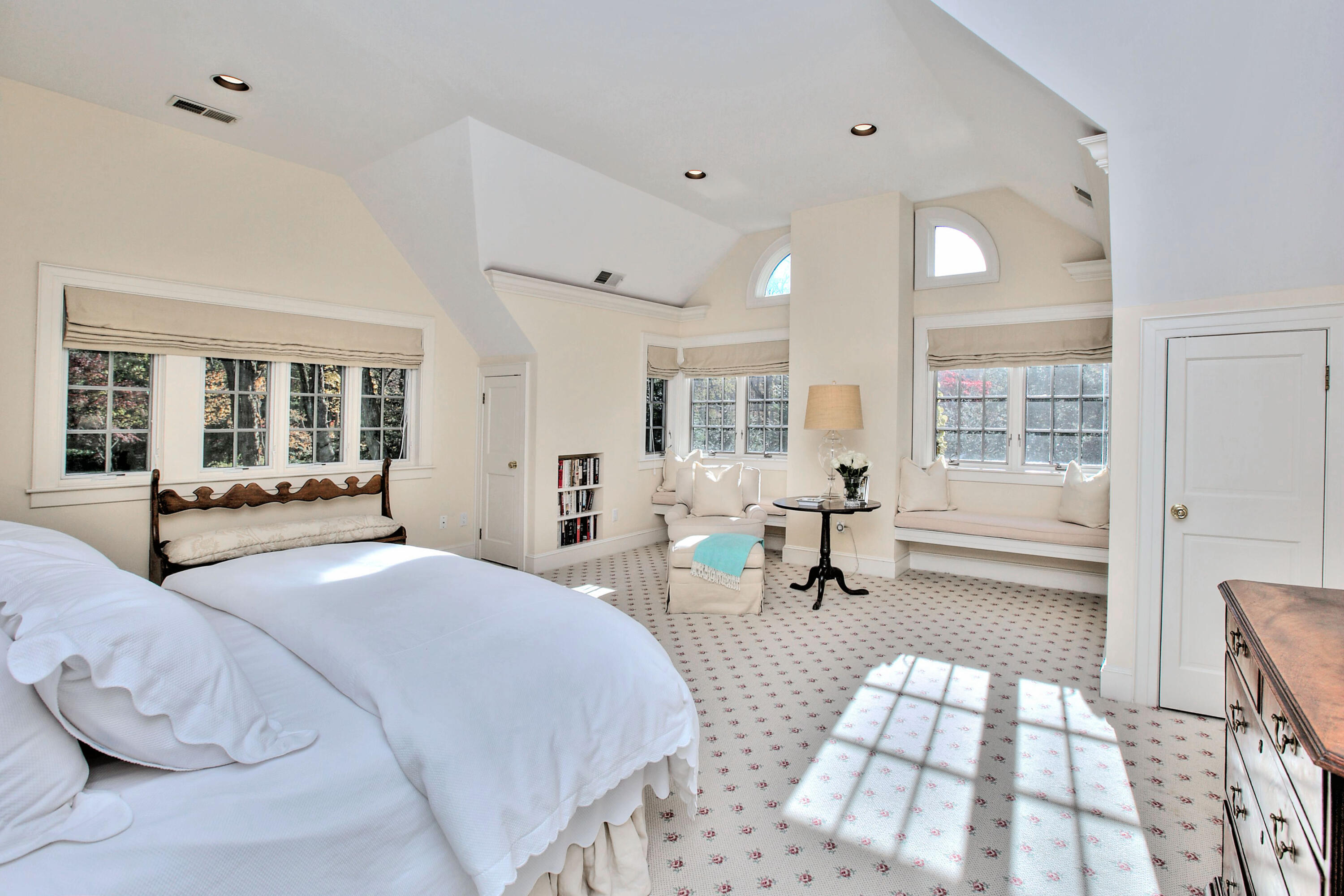 22 Mill Road New Canaan, CT 06840 - Photo 23 of 42 a spacious bedroom with a large bed and windows