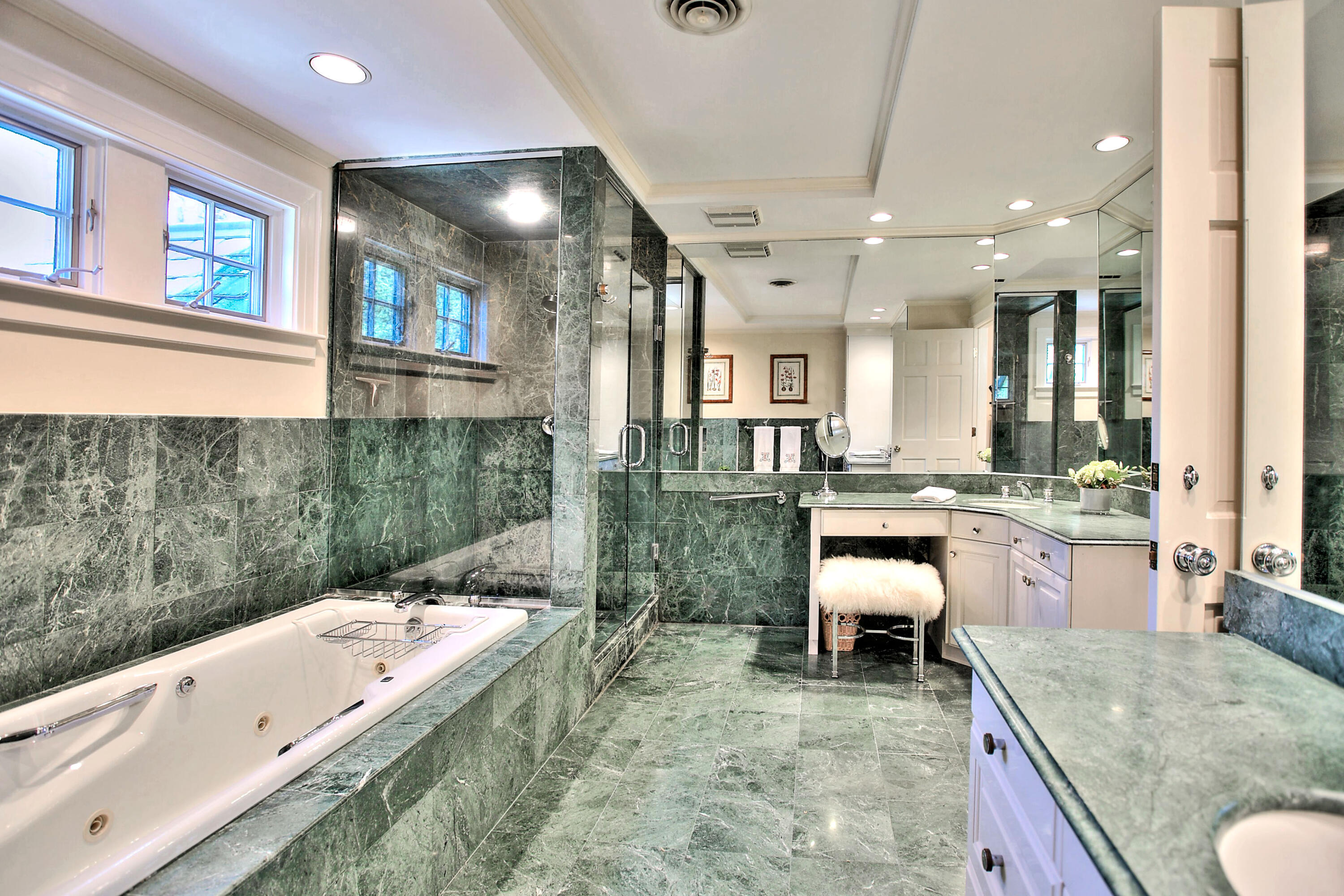 22 Mill Road New Canaan, CT 06840 - Photo 26 of 42 a large bathroom with a large tub and sink