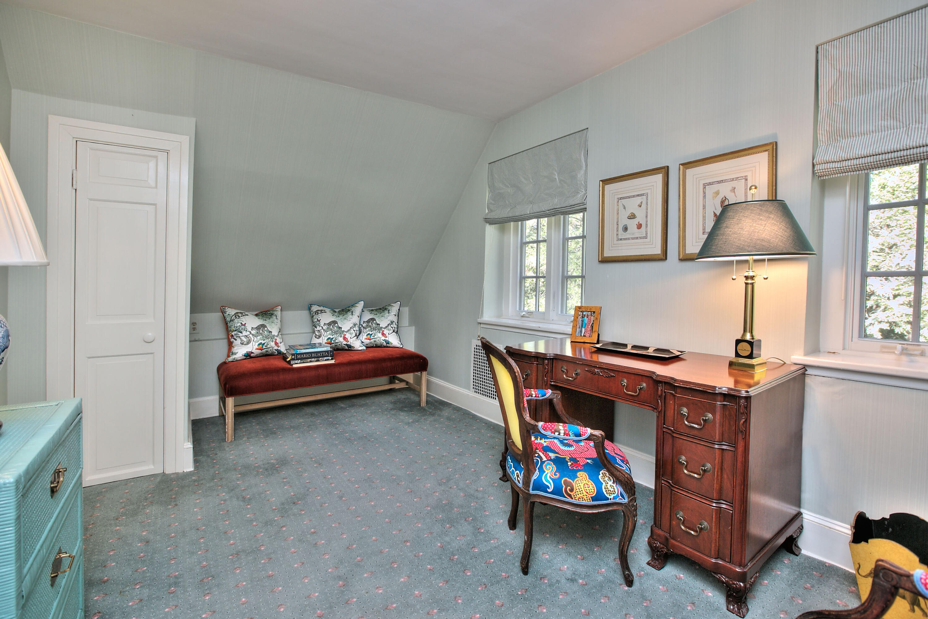 22 Mill Road New Canaan, CT 06840 - Photo 31 of 42 a bedroom with a bed and a chandelier