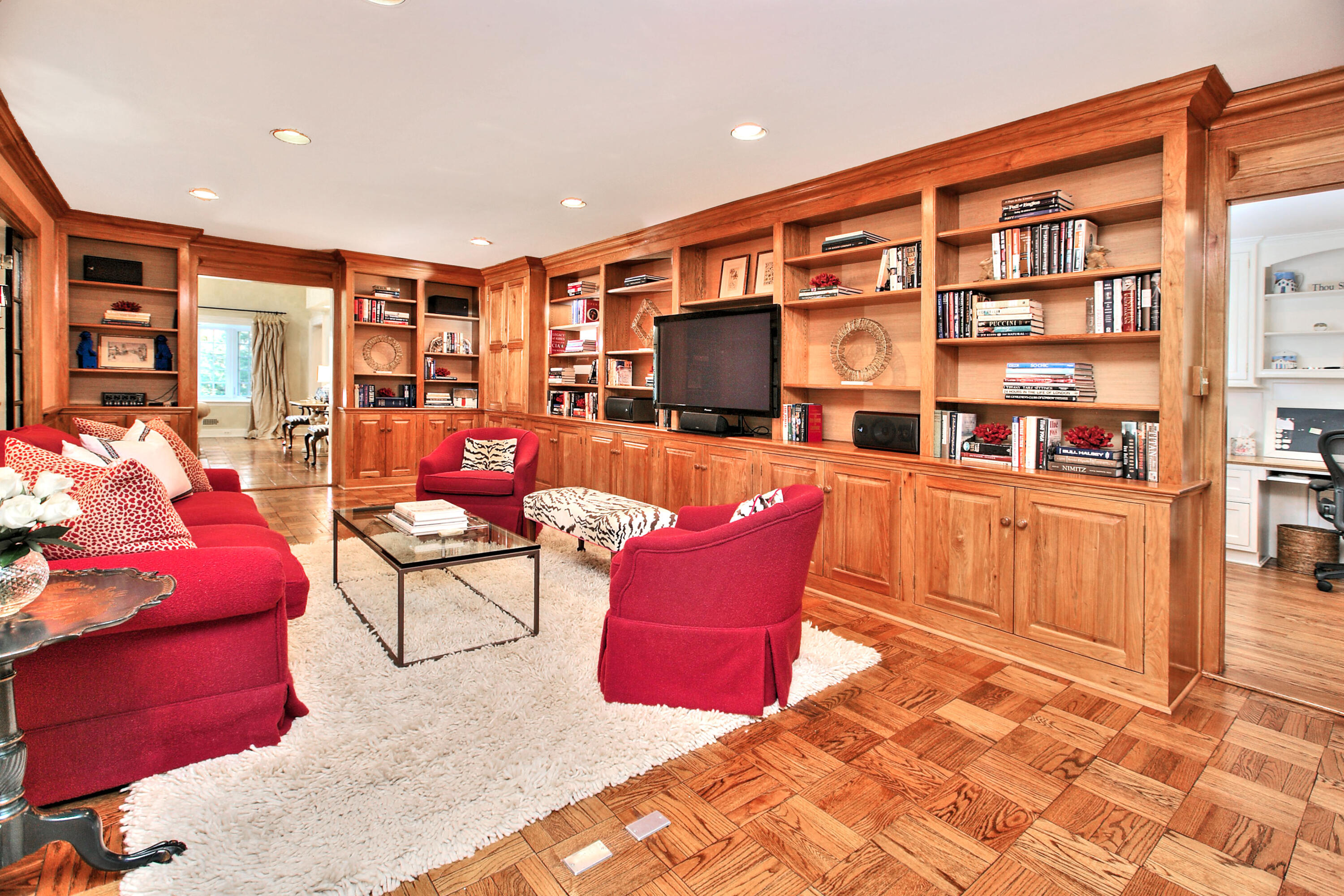 22 Mill Road New Canaan, CT 06840 - Photo 8 of 42 a living room with furniture a flat screen tv and a rug