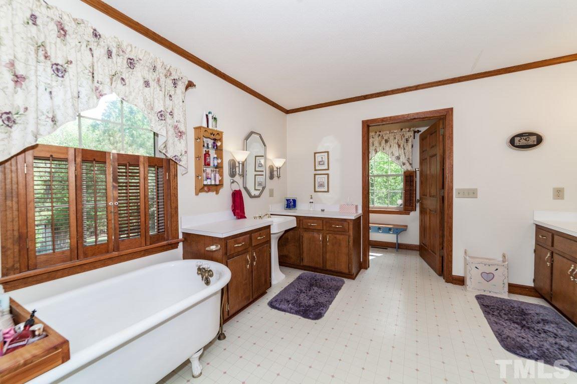 461 Hawk Road Sanford, NC 27330 - Photo 13 of 25 Featuring a luxurious claw foot tub!