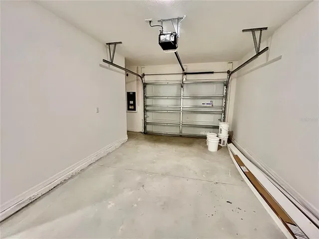 a view of room with a ceiling fan