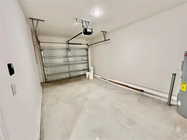 a bathroom with a sink toilet and a mirror