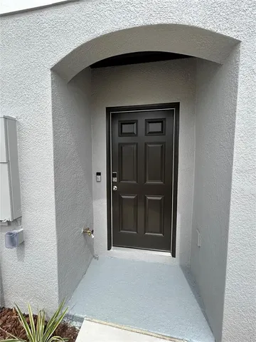 a view of a hallway with stairs