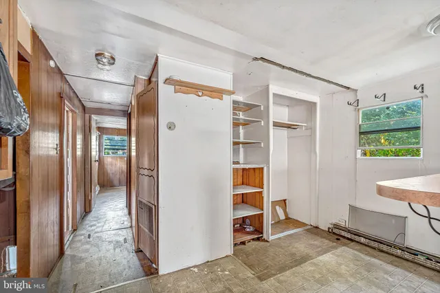 a view of a room with rack on the wall