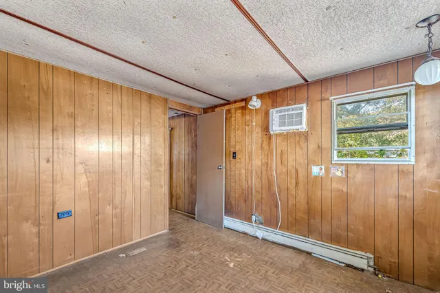 a room with furniture and a window