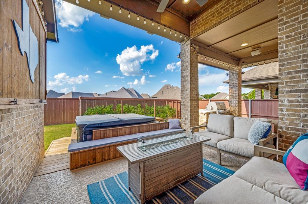 2721 Old Shire Path Road Prosper, TX 75078 - Photo 28 of 39 Covered patio featuring recessed lighting, string lights, and a ceiling fan