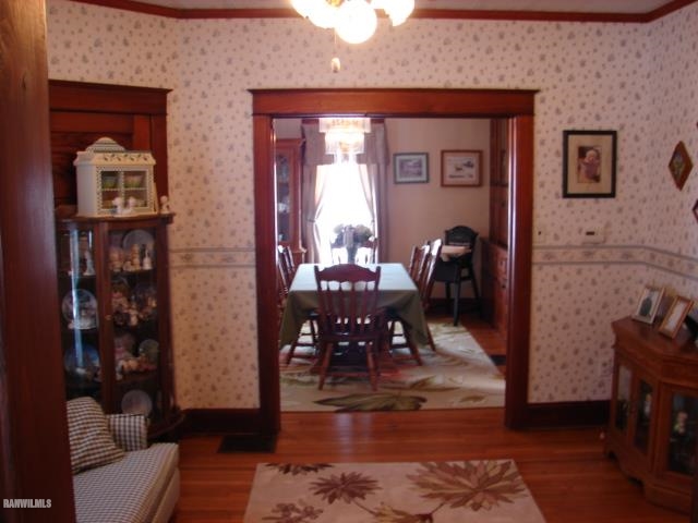 3287 East Lamm Road Freeport, IL 61032 - Photo 11 of 25 a living room with furniture and wooden floor