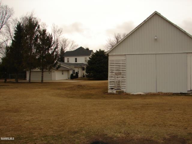 3287 East Lamm Road Freeport, IL 61032 - Photo 25 of 25 a view of a house with a yard