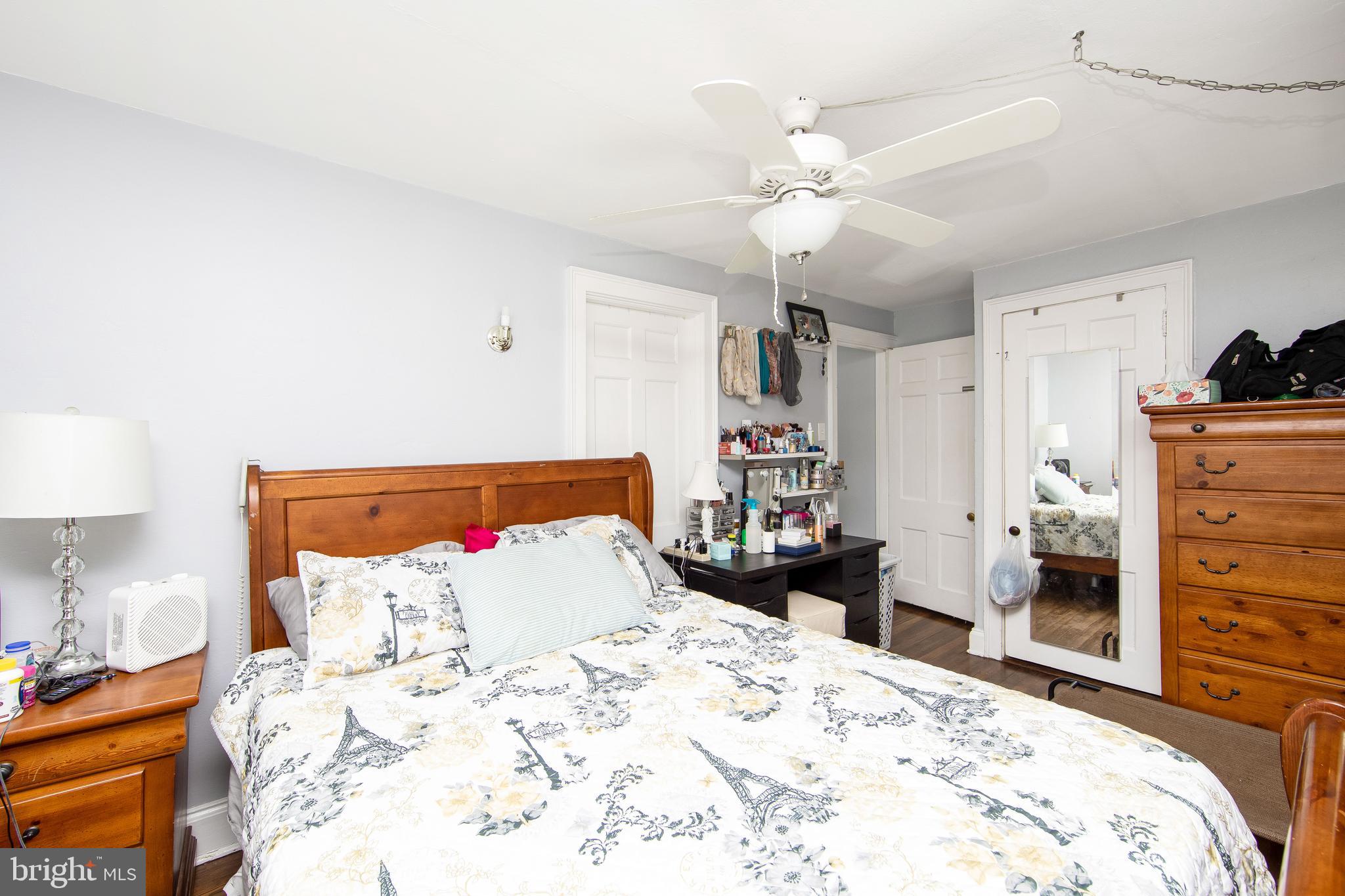 2832 Kansas Road Camden, NJ 08104 - Photo 16 of 32 a bedroom with a bed and a dresser in it