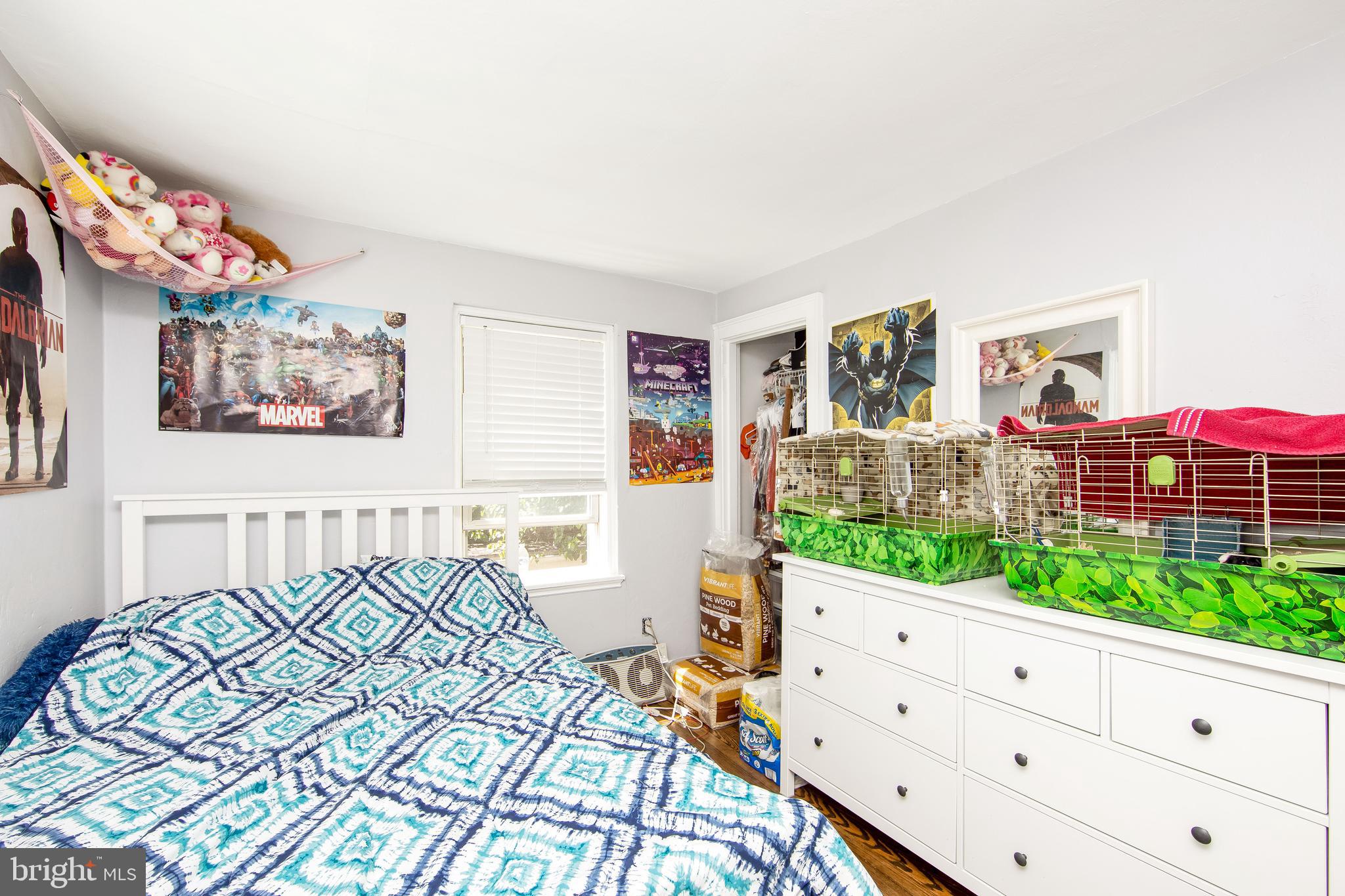 2832 Kansas Road Camden, NJ 08104 - Photo 20 of 32 a bedroom with a bed and a flat screen tv