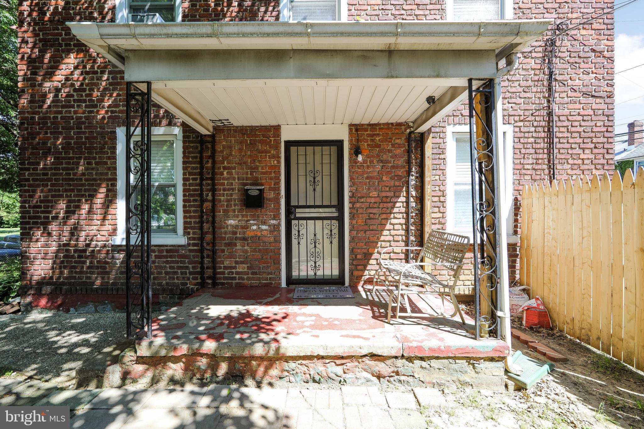 2832 Kansas Road Camden, NJ 08104 - Photo 5 of 32 a front view of a house with a garage