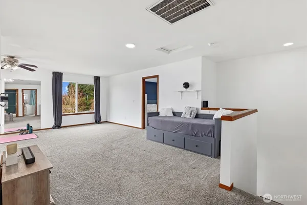 a room with furniture and window
