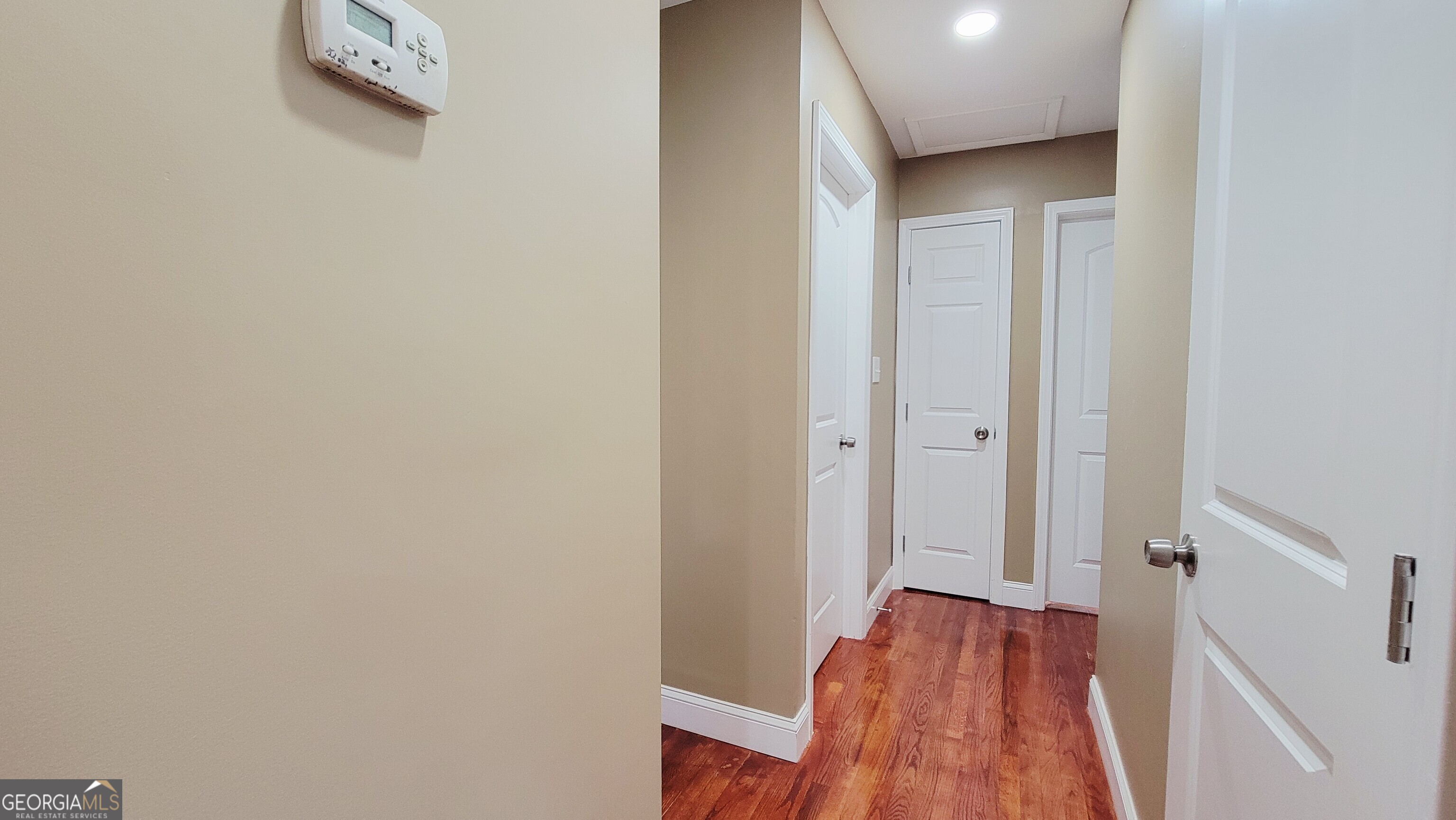 4491 Glade Road Forest Park, GA 30297 - Photo 13 of 41 a view of a hallway with wooden floor and a table