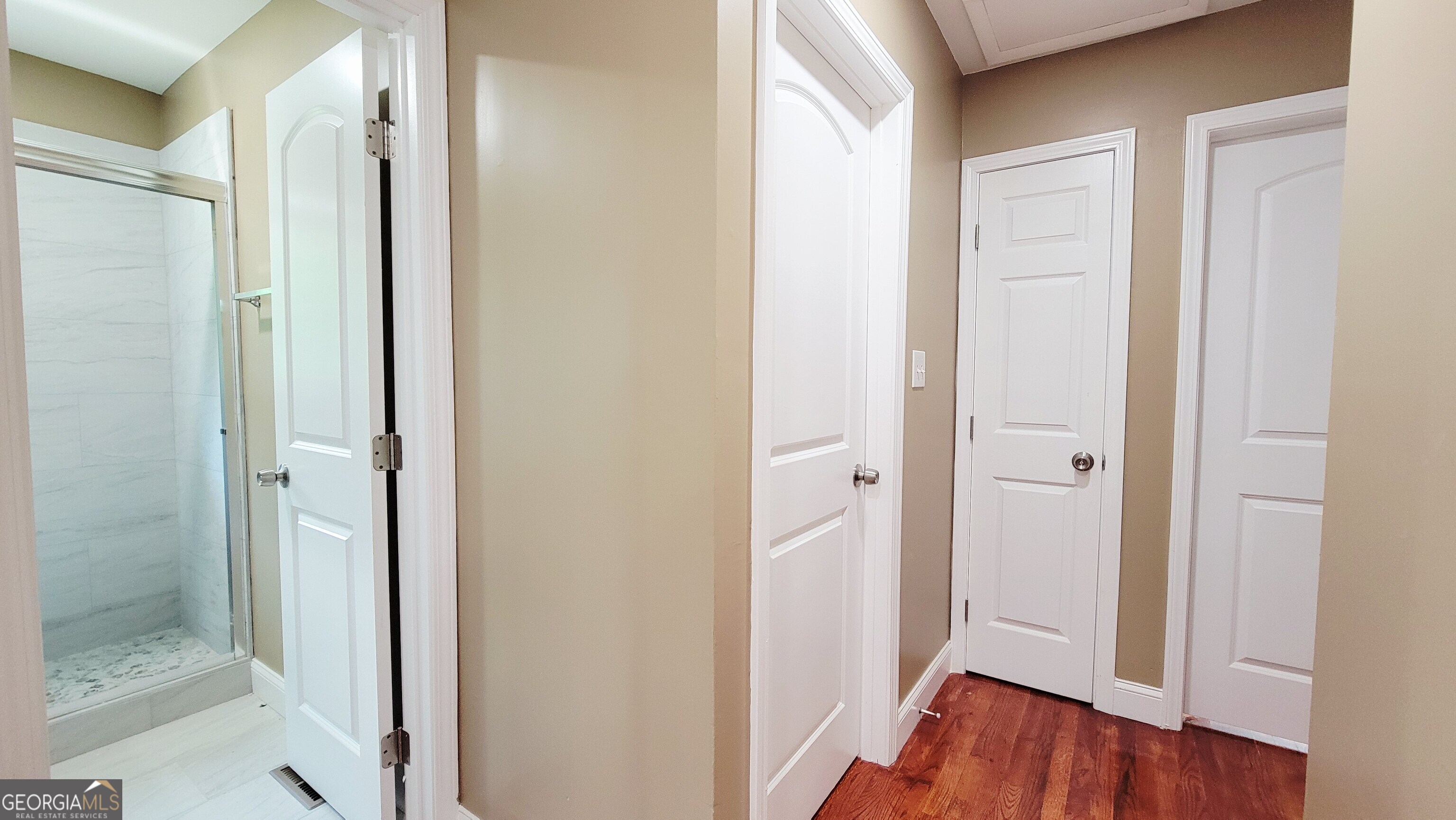 4491 Glade Road Forest Park, GA 30297 - Photo 15 of 41 a view of a hallway with wooden floor