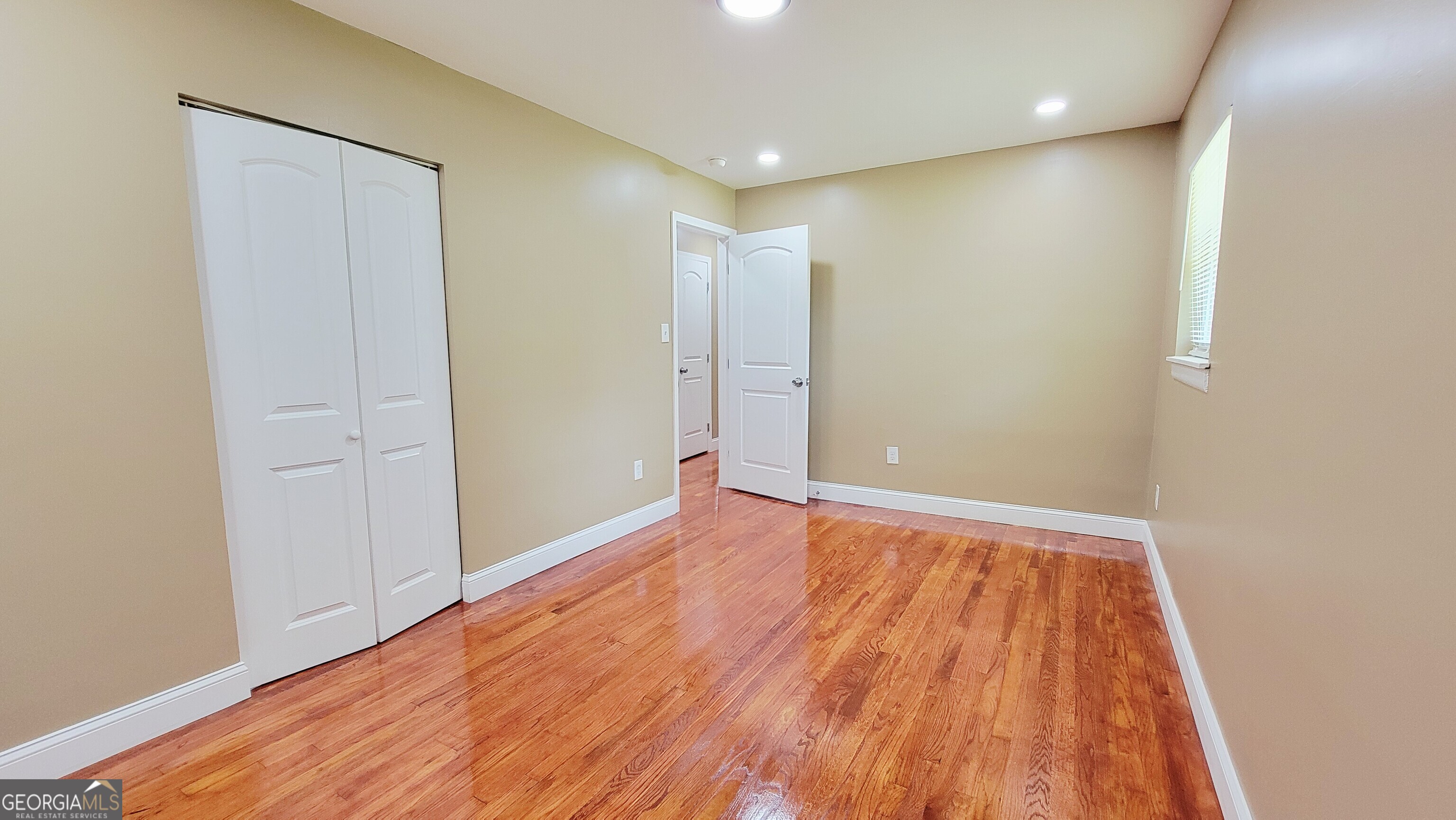 4491 Glade Road Forest Park, GA 30297 - Photo 18 of 41 wooden floor in an empty room