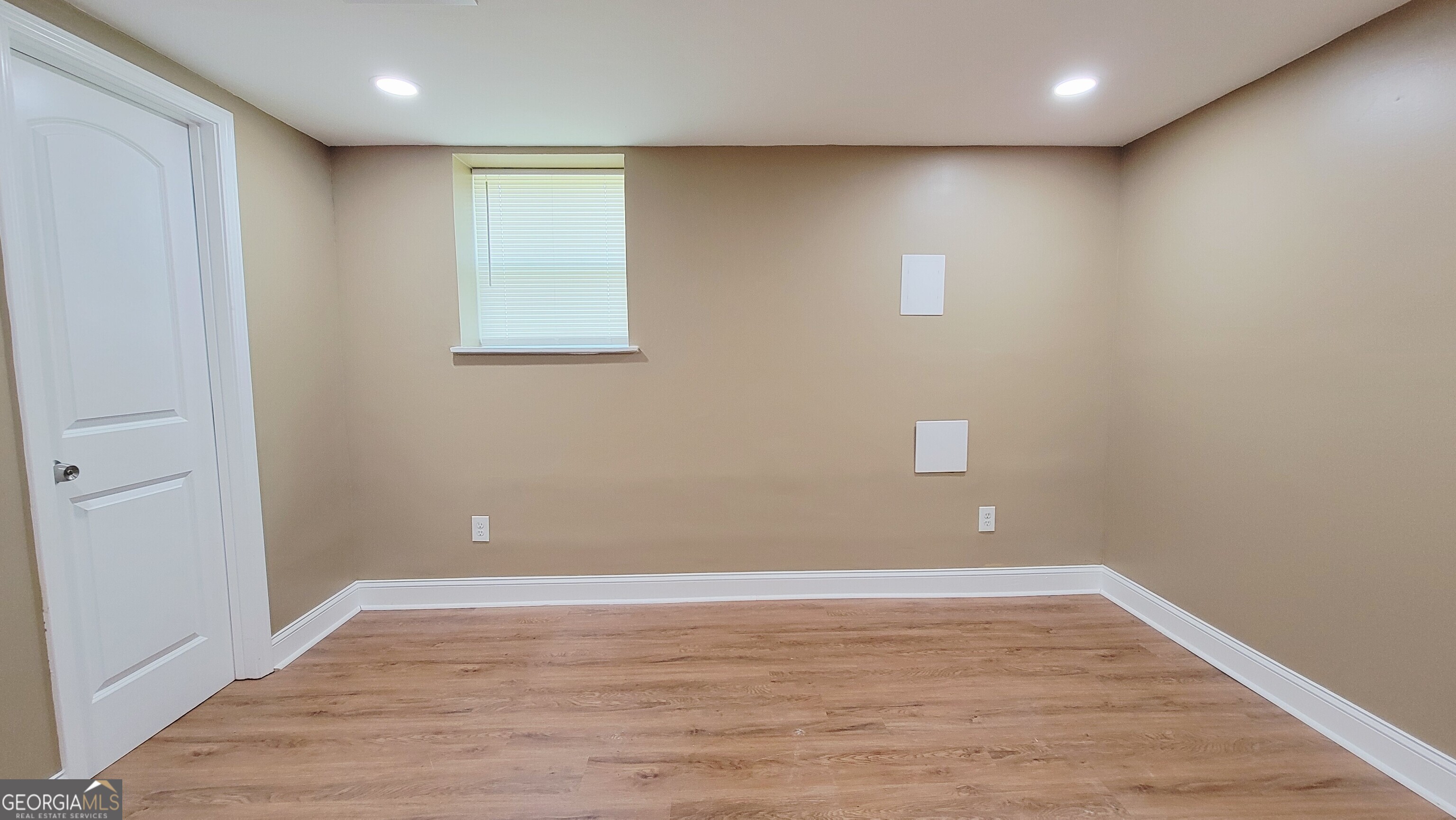 4491 Glade Road Forest Park, GA 30297 - Photo 29 of 41 a view of an empty room with wooden floor