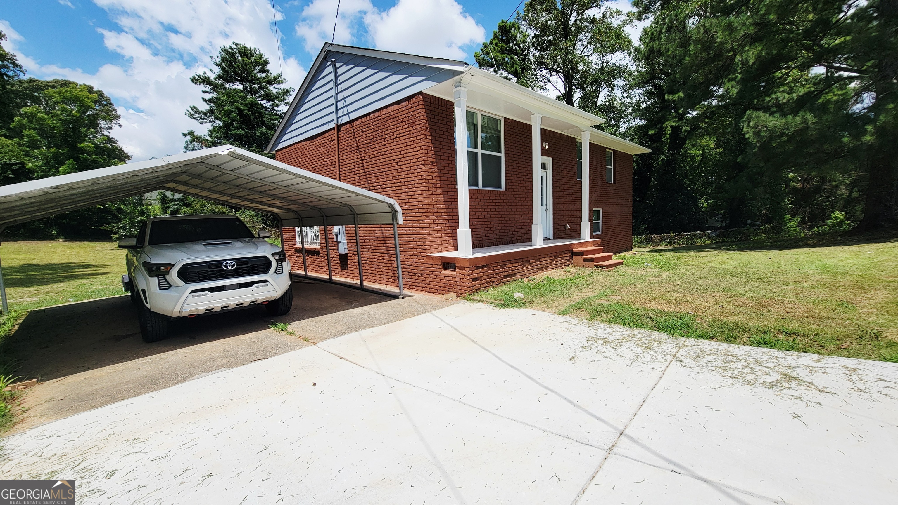 4491 Glade Road Forest Park, GA 30297 - Photo 4 of 41 a car parked in front of house