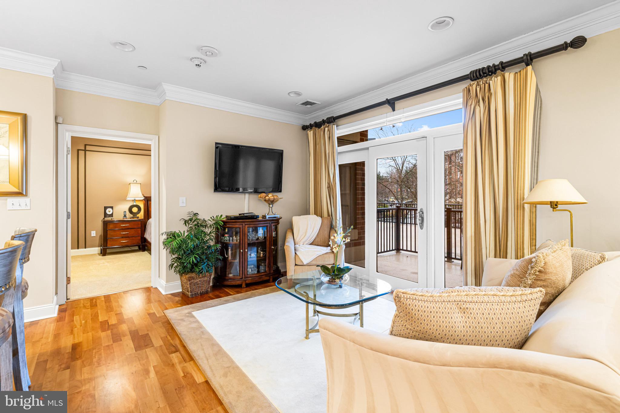 227 Carson Terrace Huntingdon Valley, PA 19006 - Photo 9 of 32 a living room with furniture and a flat screen tv