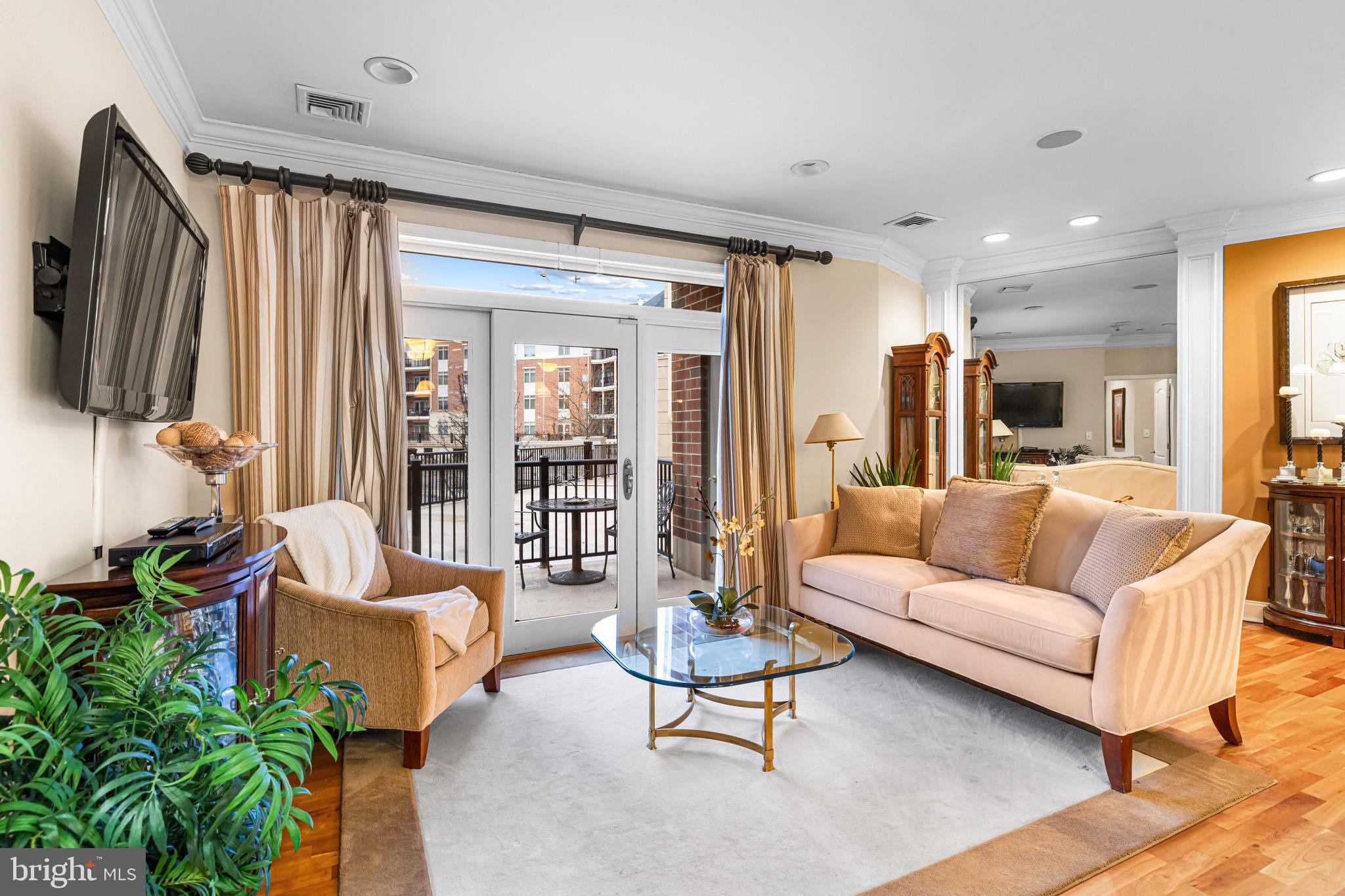 227 Carson Terrace Huntingdon Valley, PA 19006 - Photo 10 of 32 a living room with furniture and a flat screen tv