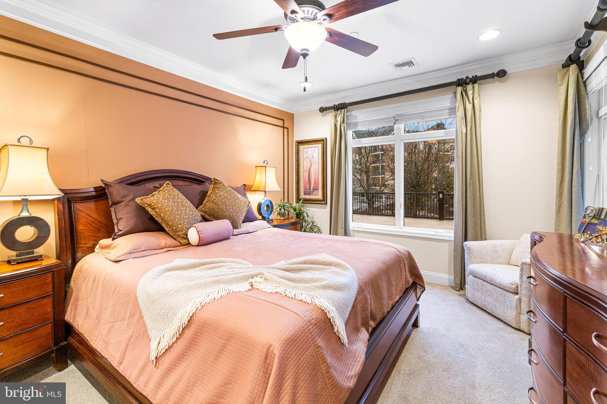 227 Carson Terrace Huntingdon Valley, PA 19006 - Photo 14 of 32 a bedroom with a large bed and a large window