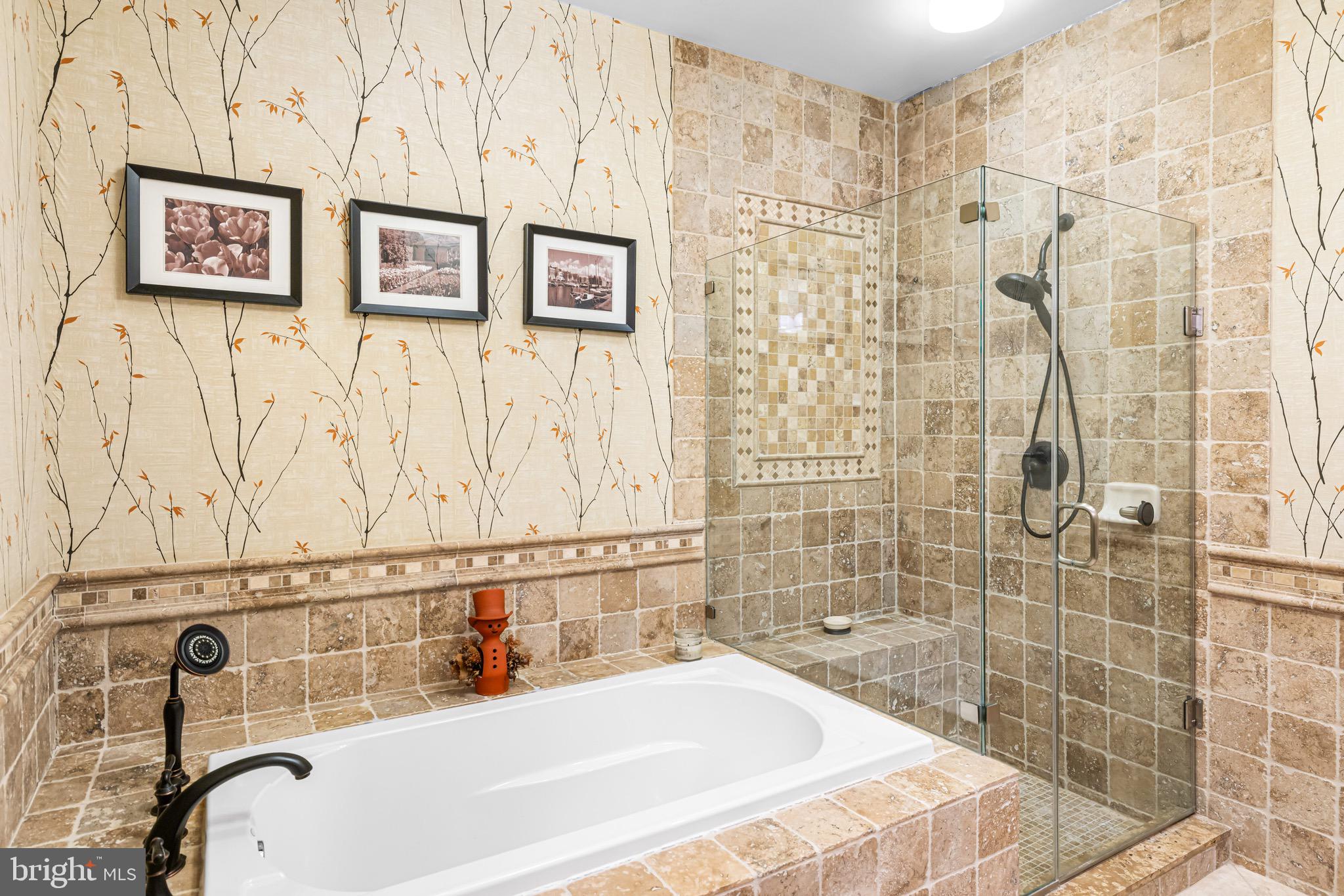 227 Carson Terrace Huntingdon Valley, PA 19006 - Photo 18 of 32 a bathroom with a bathtub and shower