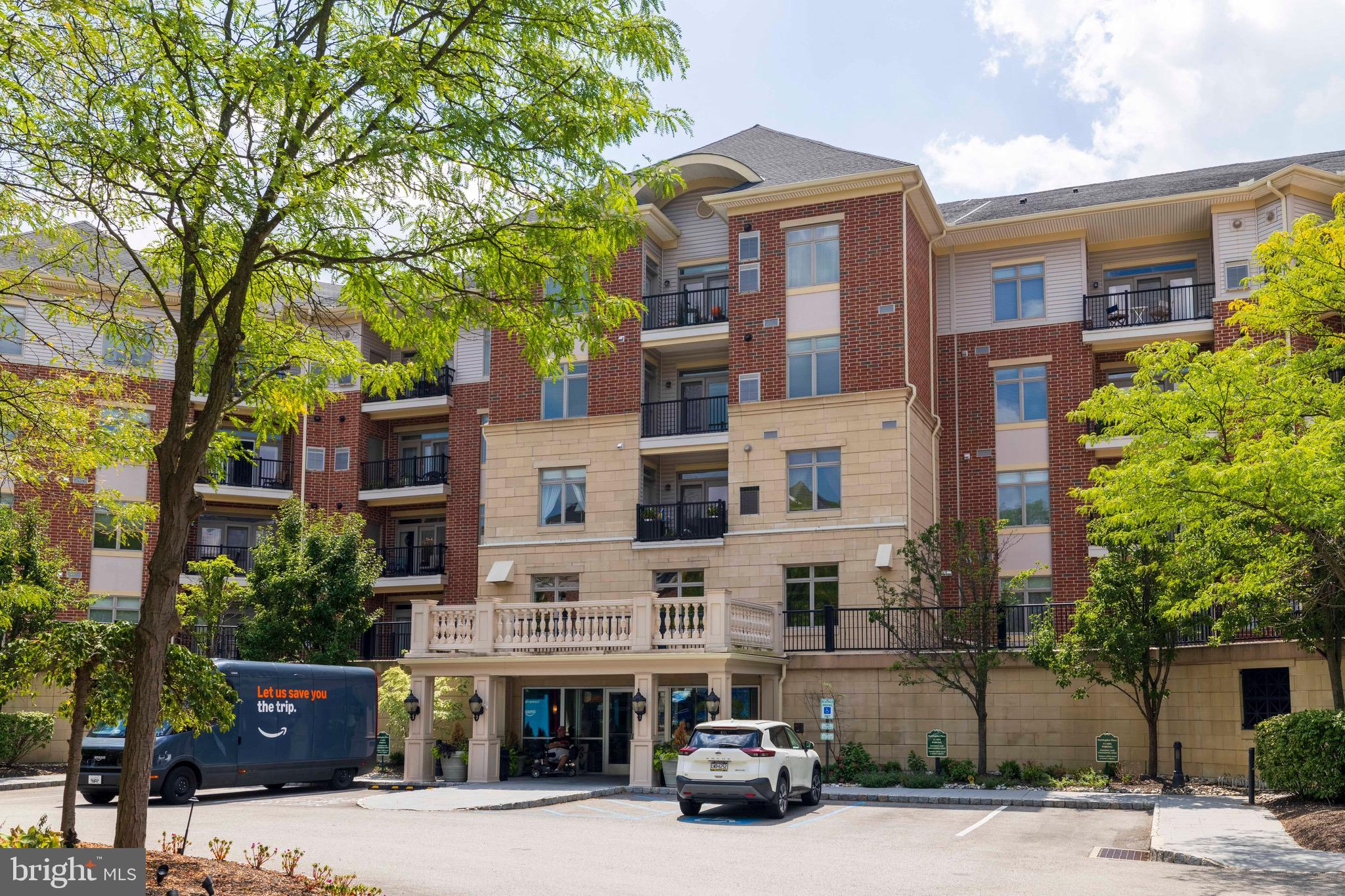 227 Carson Terrace Huntingdon Valley, PA 19006 - Photo 2 of 32 a car parked in front of a building
