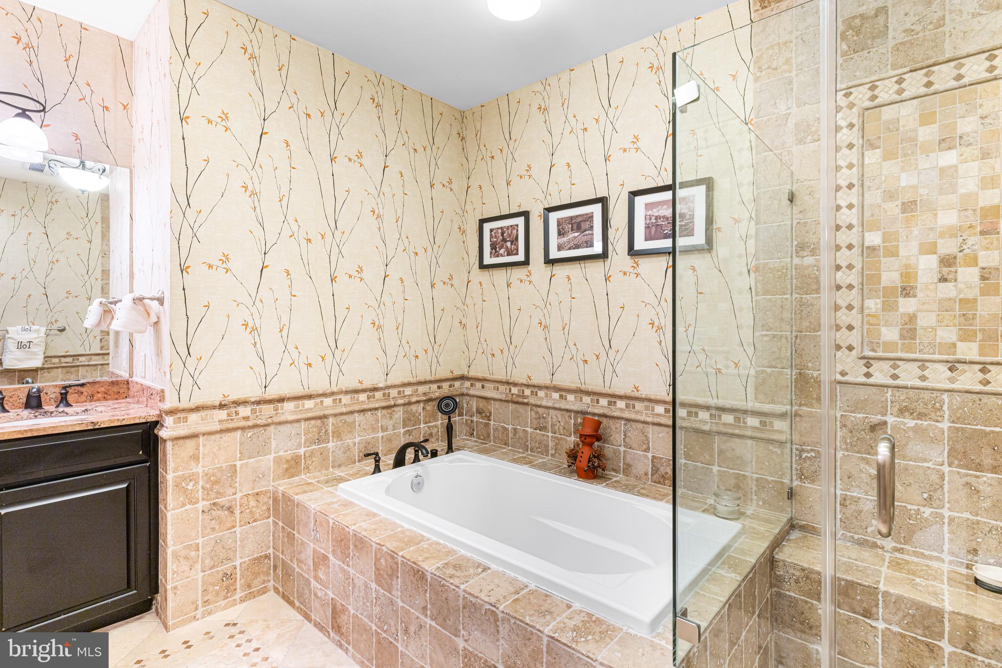 227 Carson Terrace Huntingdon Valley, PA 19006 - Photo 19 of 32 a bathroom with a bathtub and shower