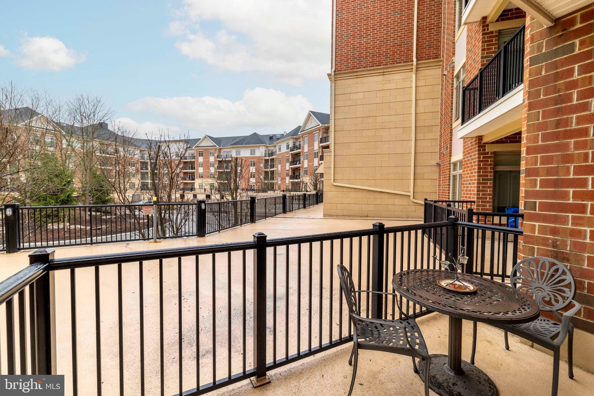 227 Carson Terrace Huntingdon Valley, PA 19006 - Photo 22 of 32 a view of a balcony with a floor to ceiling window and wooden floor
