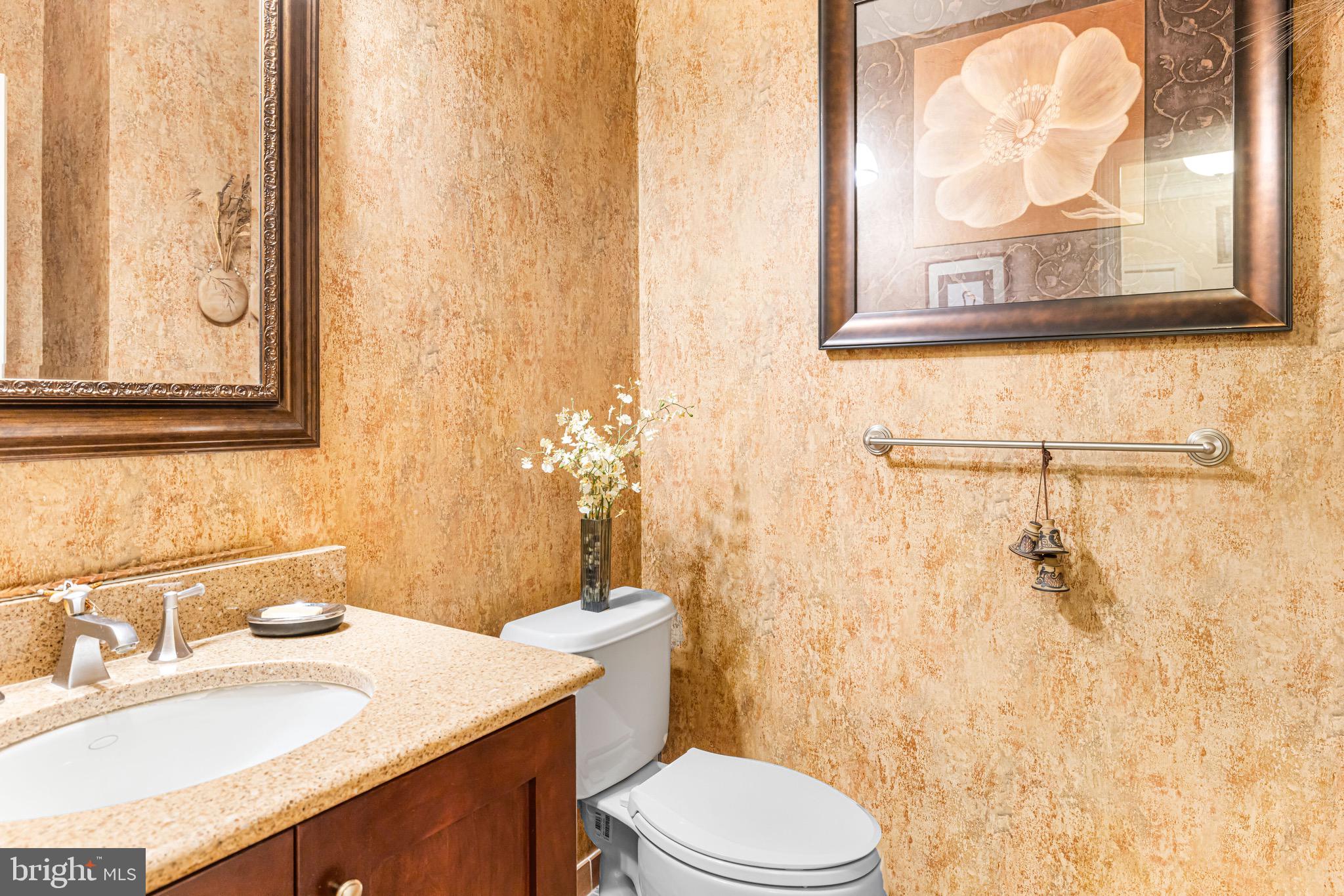 227 Carson Terrace Huntingdon Valley, PA 19006 - Photo 4 of 32 a bathroom with a sink vanity mirror and toilet