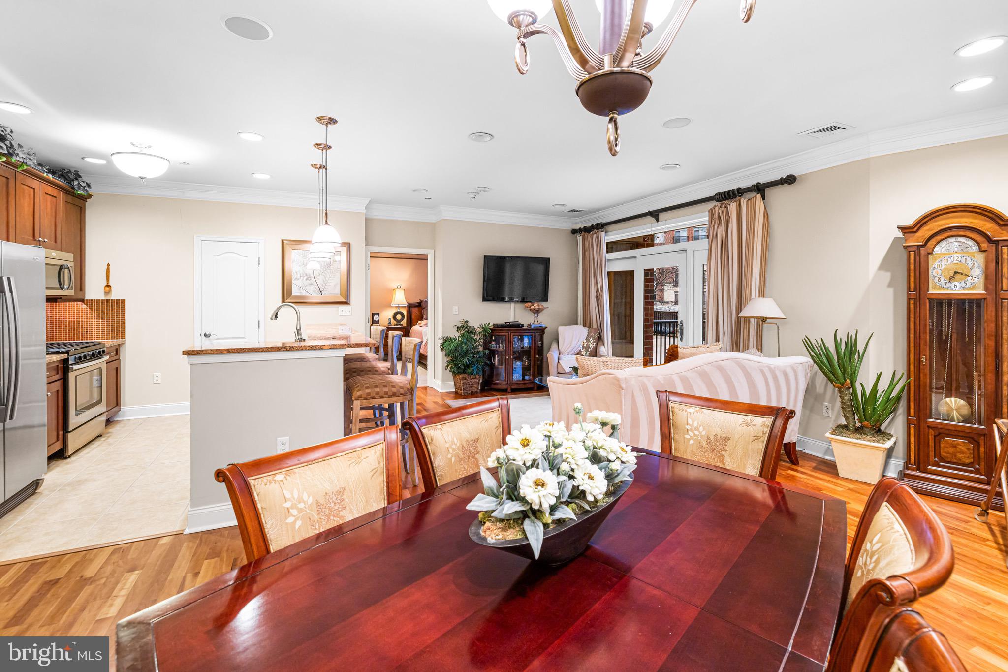 227 Carson Terrace Huntingdon Valley, PA 19006 - Photo 6 of 32 a living room with furniture fireplace and a large window
