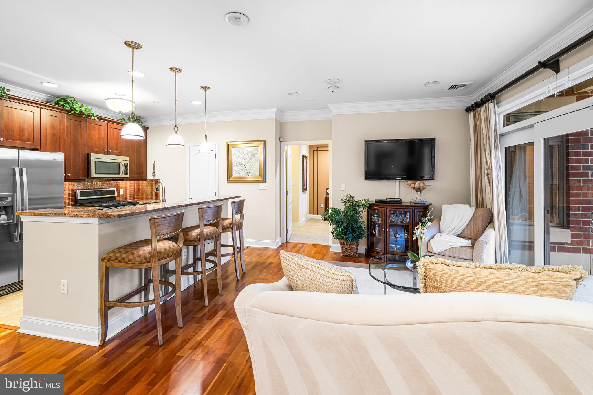 227 Carson Terrace Huntingdon Valley, PA 19006 - Photo 32 of 32 a living room with fireplace furniture and a flat screen tv