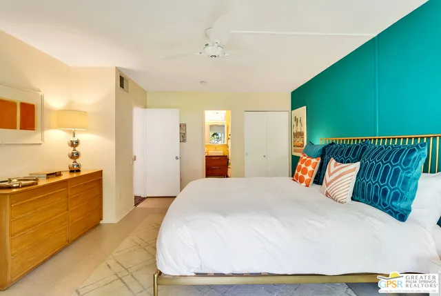 a large white bed in a white room