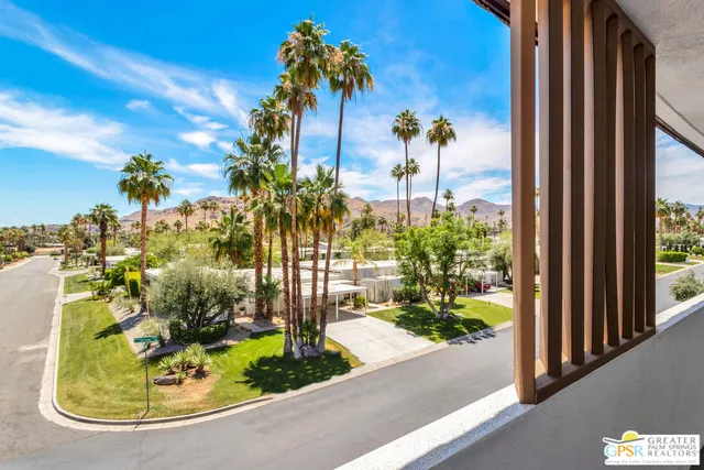 a view of a garden with a slide