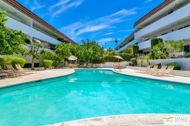 a front view of a house with swimming pool