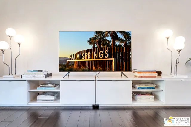 a kitchen with a refrigerator and cabinets
